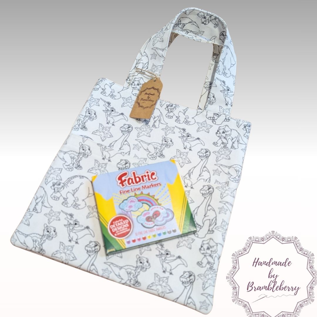 fabric bag featuring dinosaurs