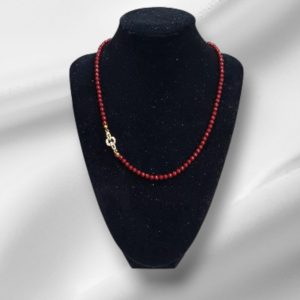 dark red simulated pearl necklace