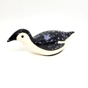 Penguin on her belly